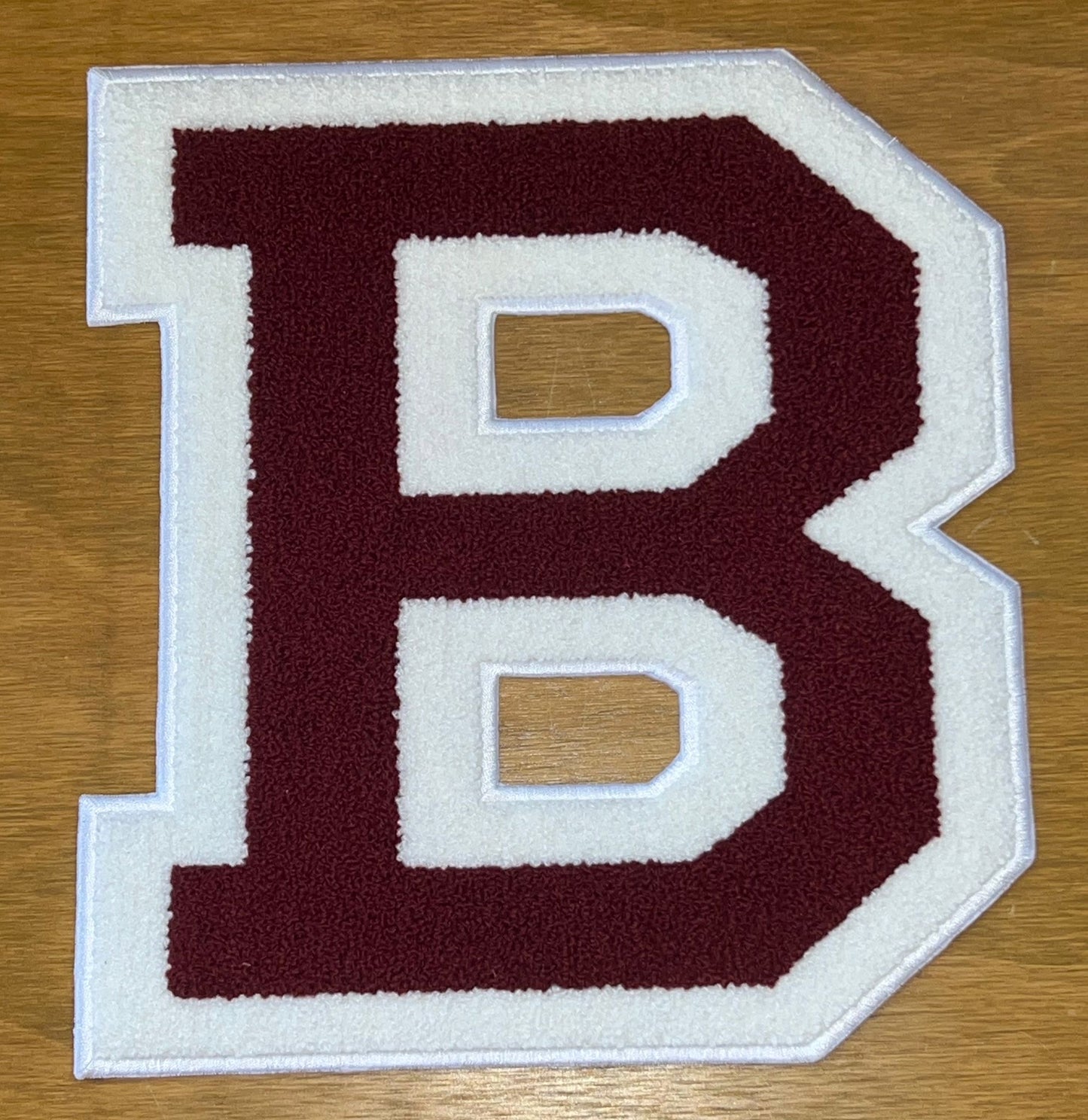 Maroon and white B